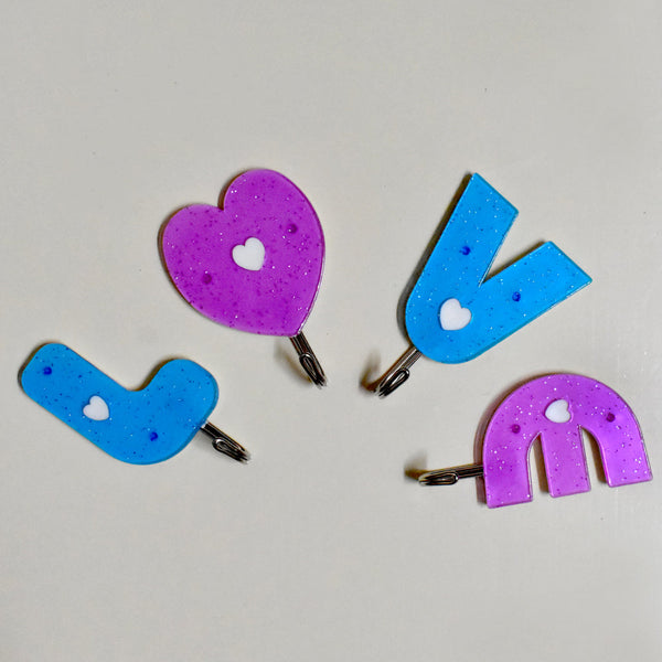 Love-shaped self-adhesive hooks for home use.