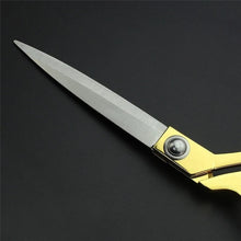 Sharp golden tailoring scissors, perfect for cutting fabric.