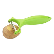 Efficient stainless steel vegetable and fruit peeler for smooth and quick peeling.