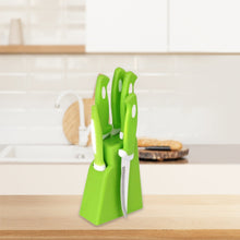 Ergonomic kitchen knife and peeler set with holder.