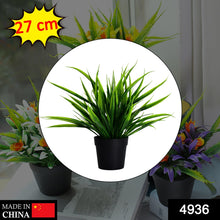 Potted artificial plant with a stylish pot.