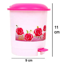 Compact plastic pedal dustbin for home office or desk use.