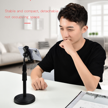 Adjustable mobile phone stand, suitable for desktop use, sturdy and height adjustable.